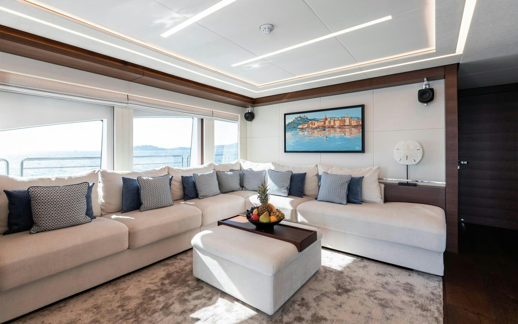 a living room with a couch and a coffee table aboard ALTAVITA Yacht for Sale