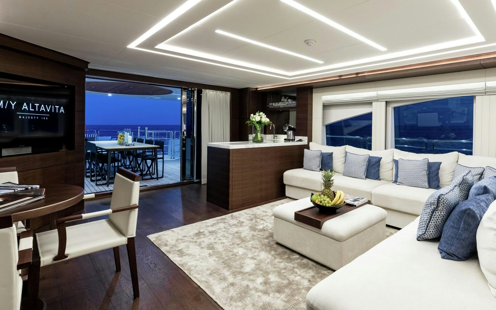 a living room with a large window aboard ALTAVITA Yacht for Sale