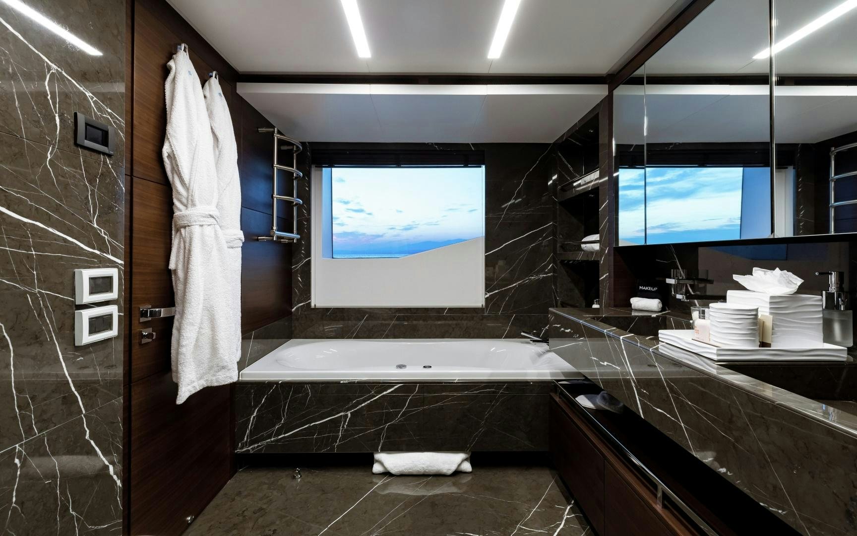 a bathroom with a large screen aboard ALTAVITA Yacht for Sale