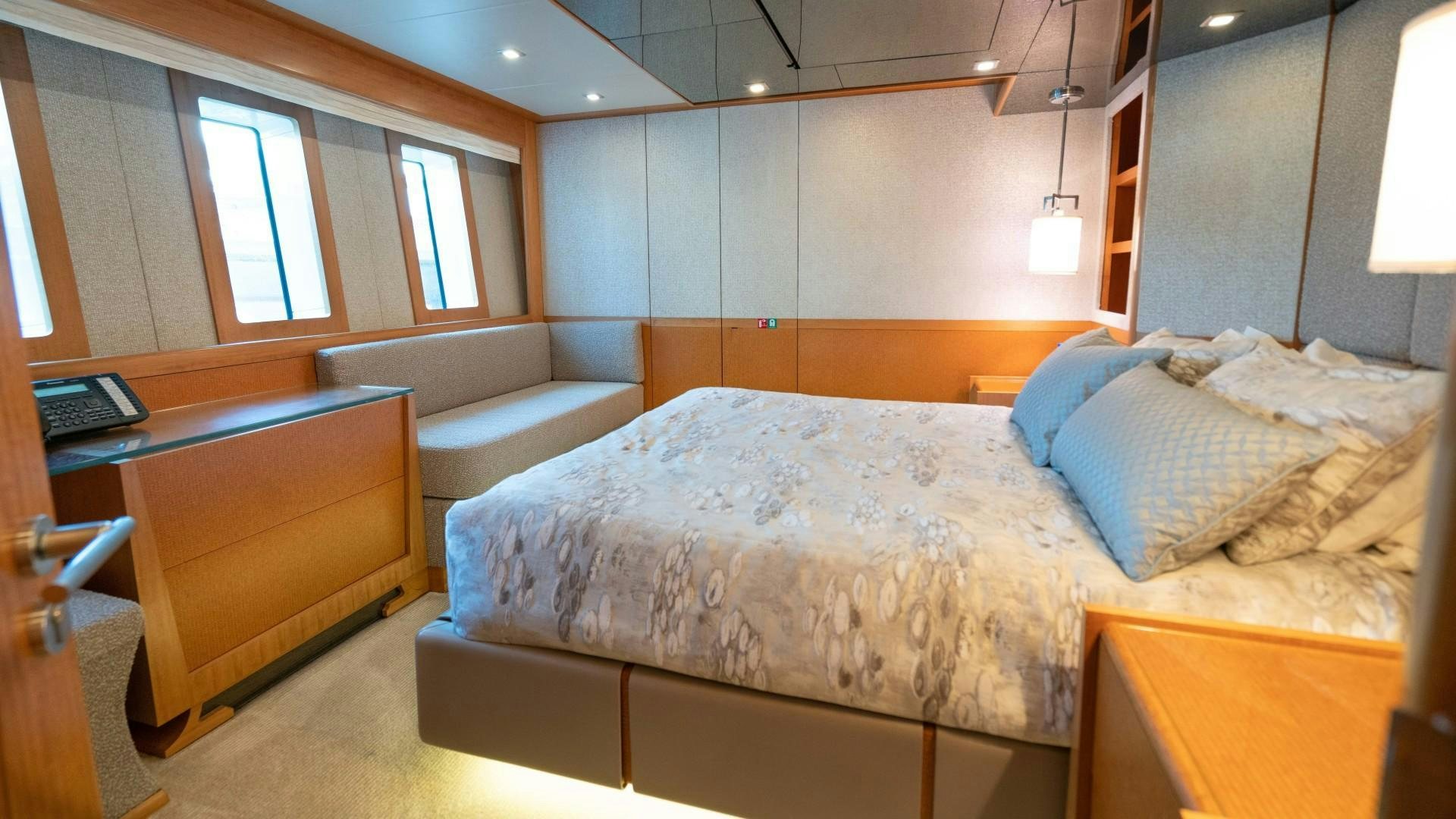 a bed in a room aboard SERENITY Yacht for Sale