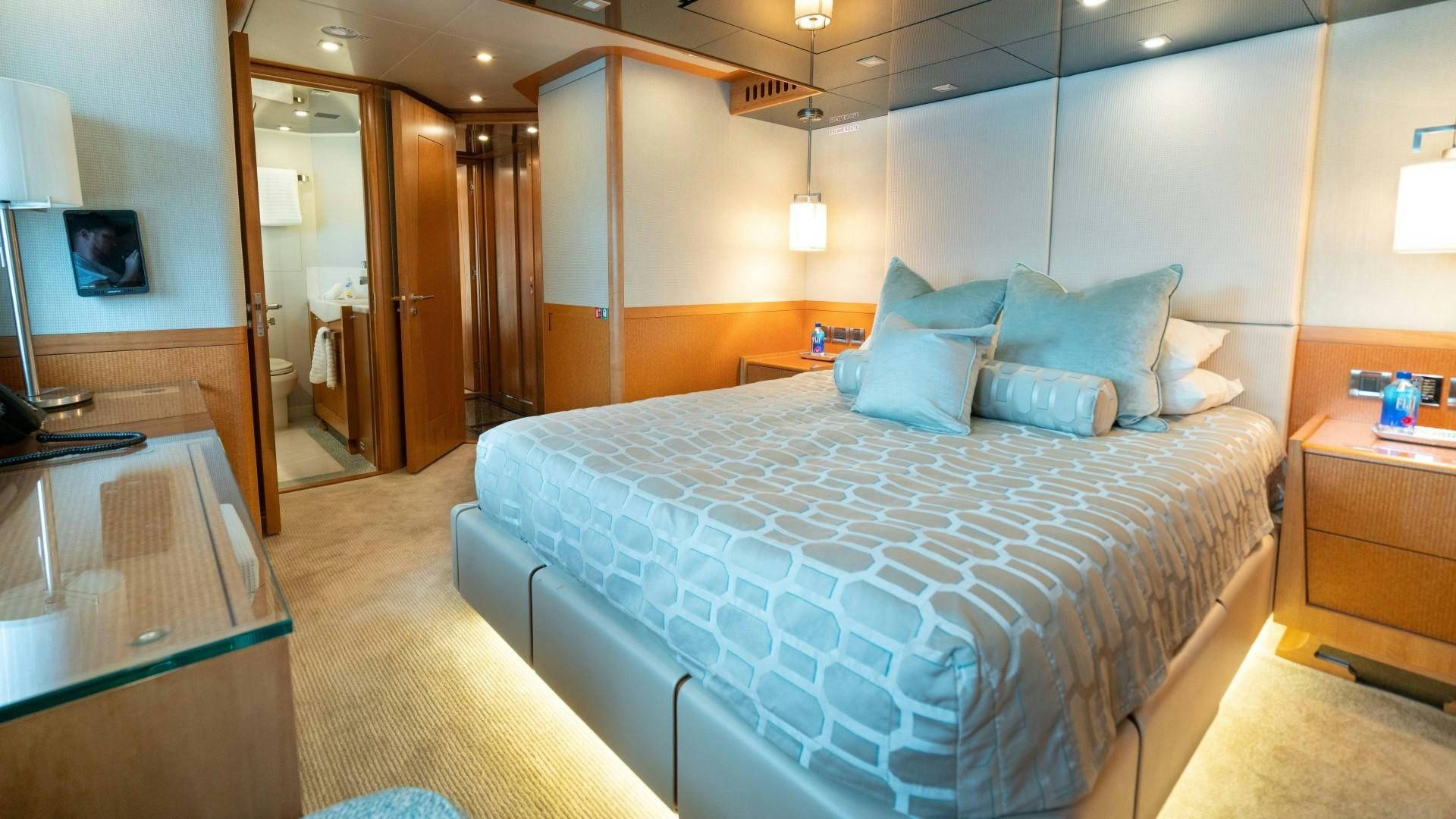 a bed in a hotel room aboard SERENITY Yacht for Sale