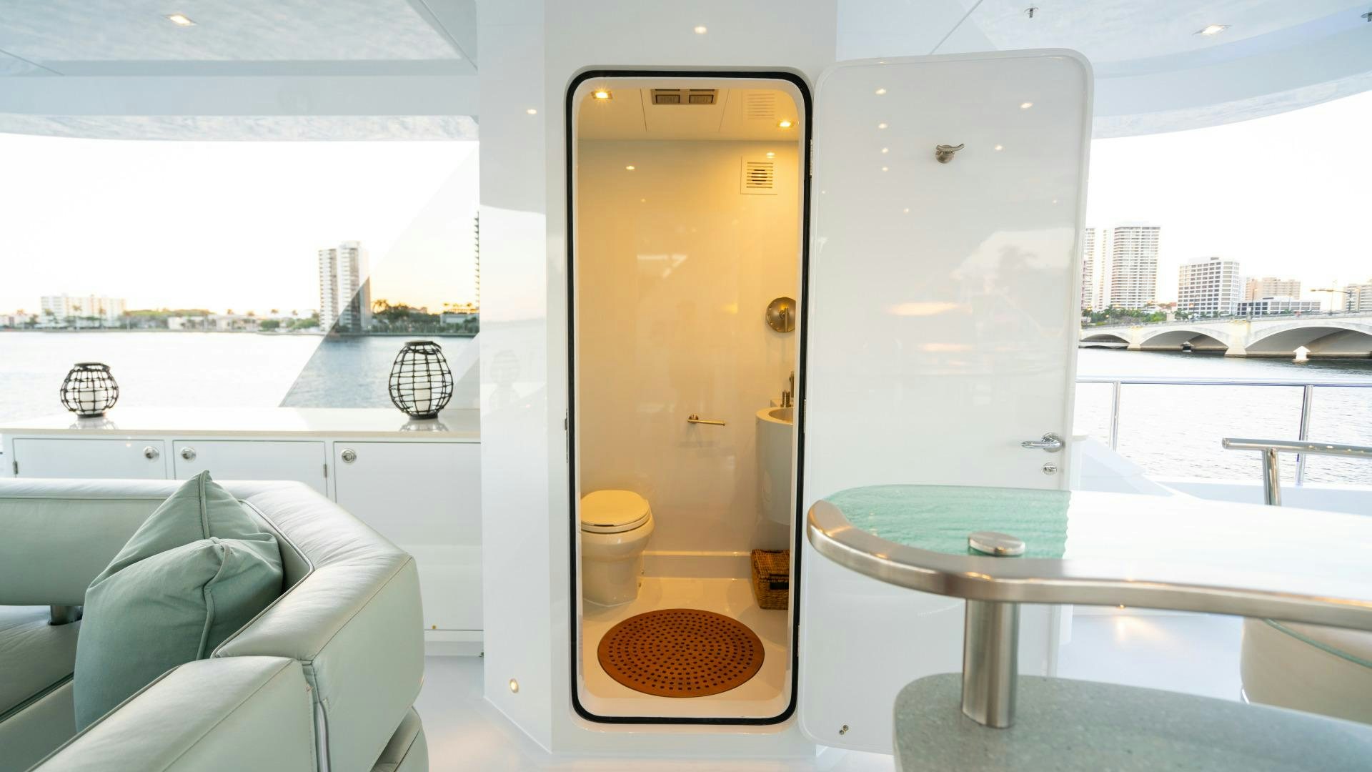 a room with a table and a window aboard SERENITY Yacht for Sale