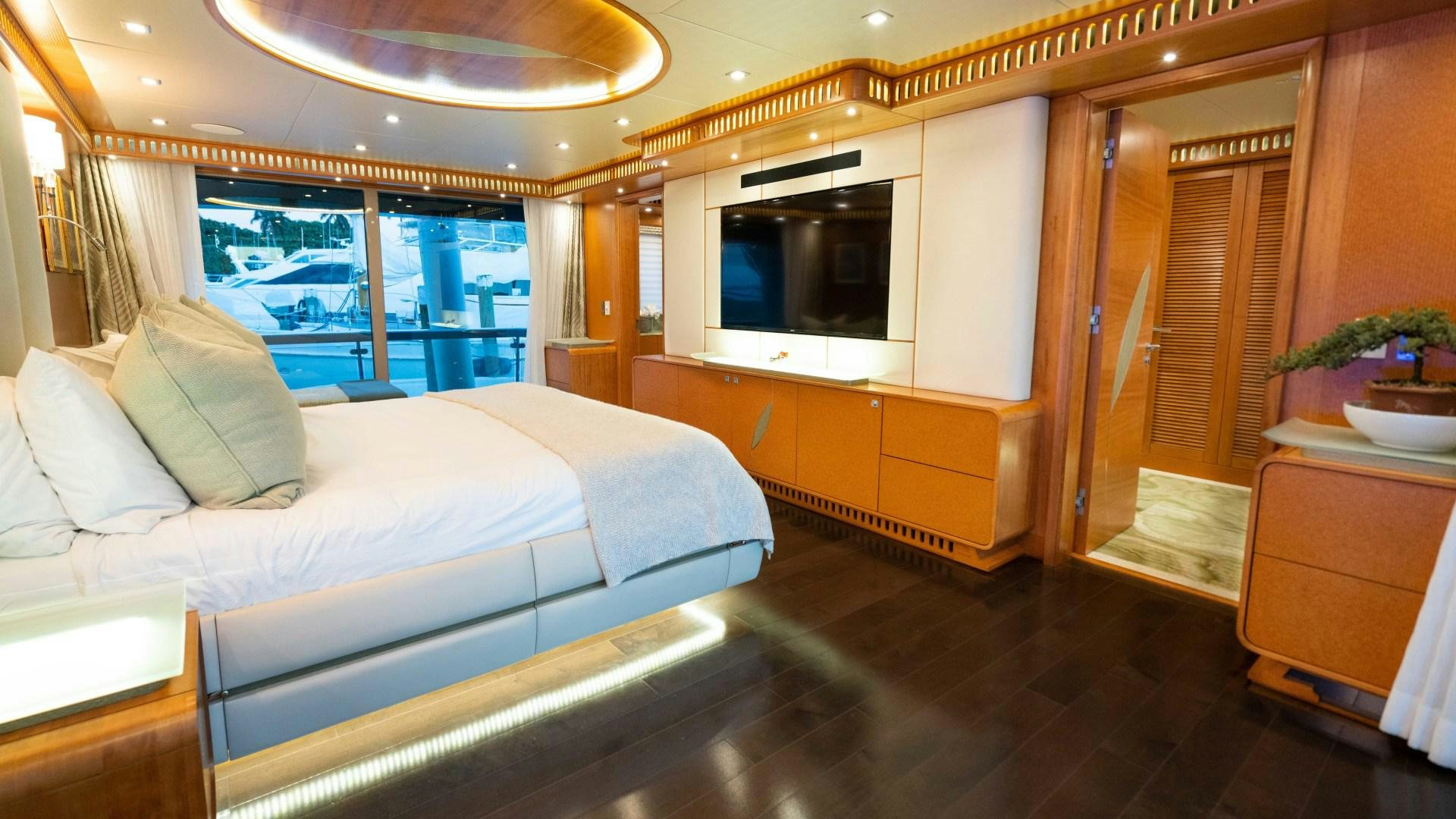 a bed in a room aboard SERENITY Yacht for Sale
