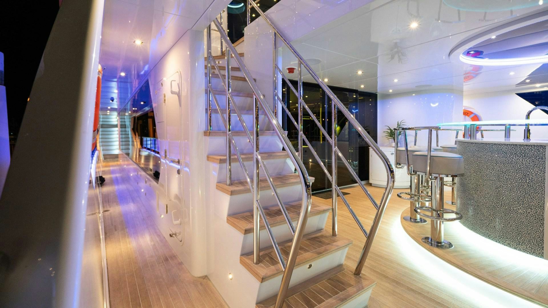 a set of stairs in a building aboard SERENITY Yacht for Sale