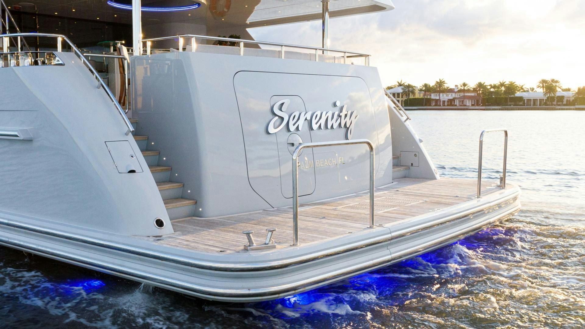 a white boat on the water aboard SERENITY Yacht for Sale