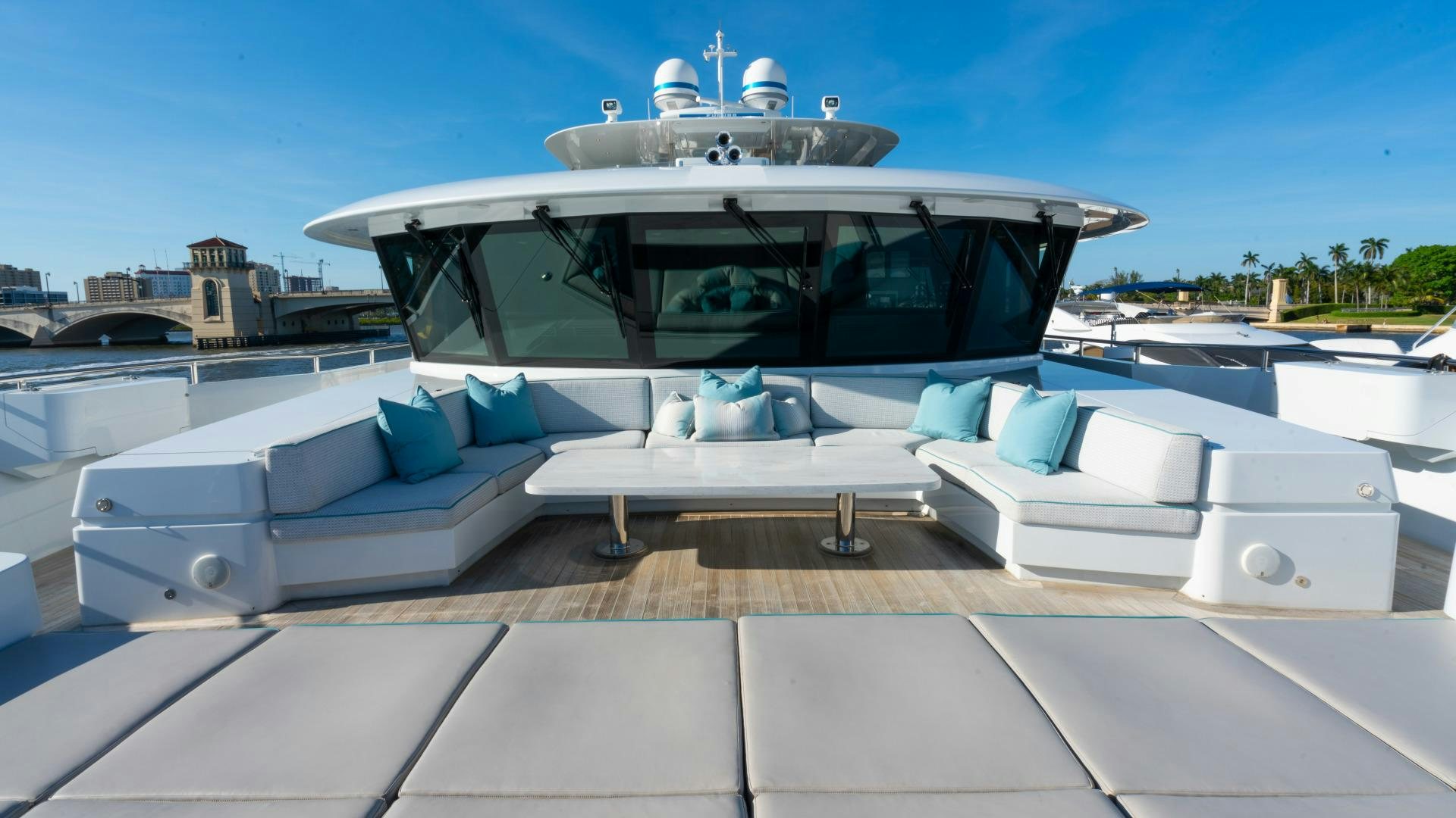 a white boat on a deck aboard SERENITY Yacht for Sale