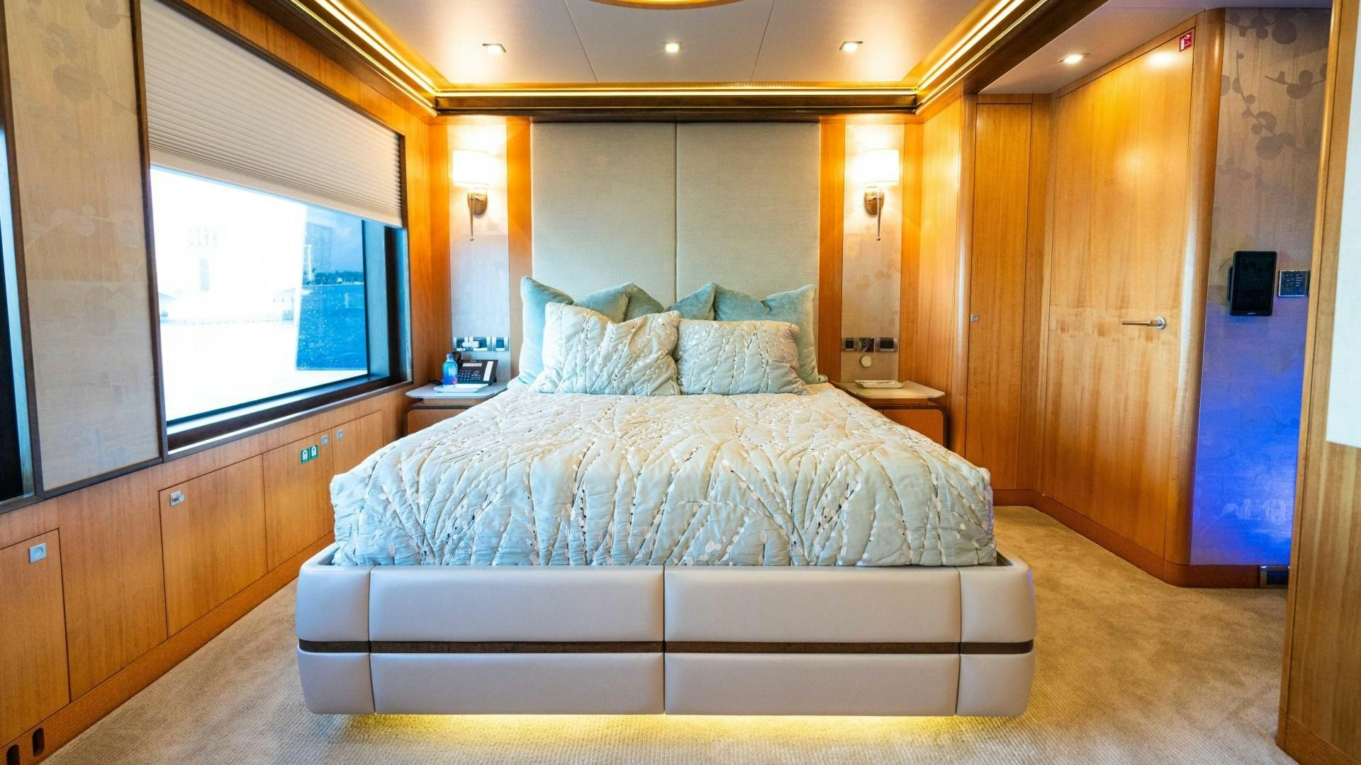 a bed in a room aboard SERENITY Yacht for Sale