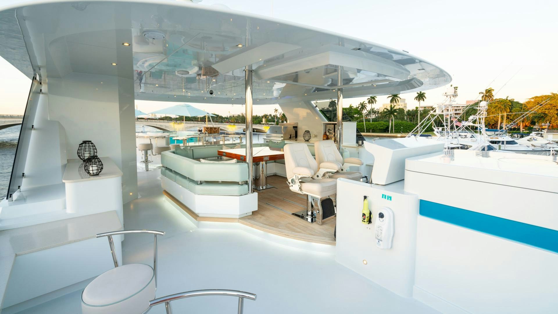 a room with a lounge chair and a pool aboard SERENITY Yacht for Sale