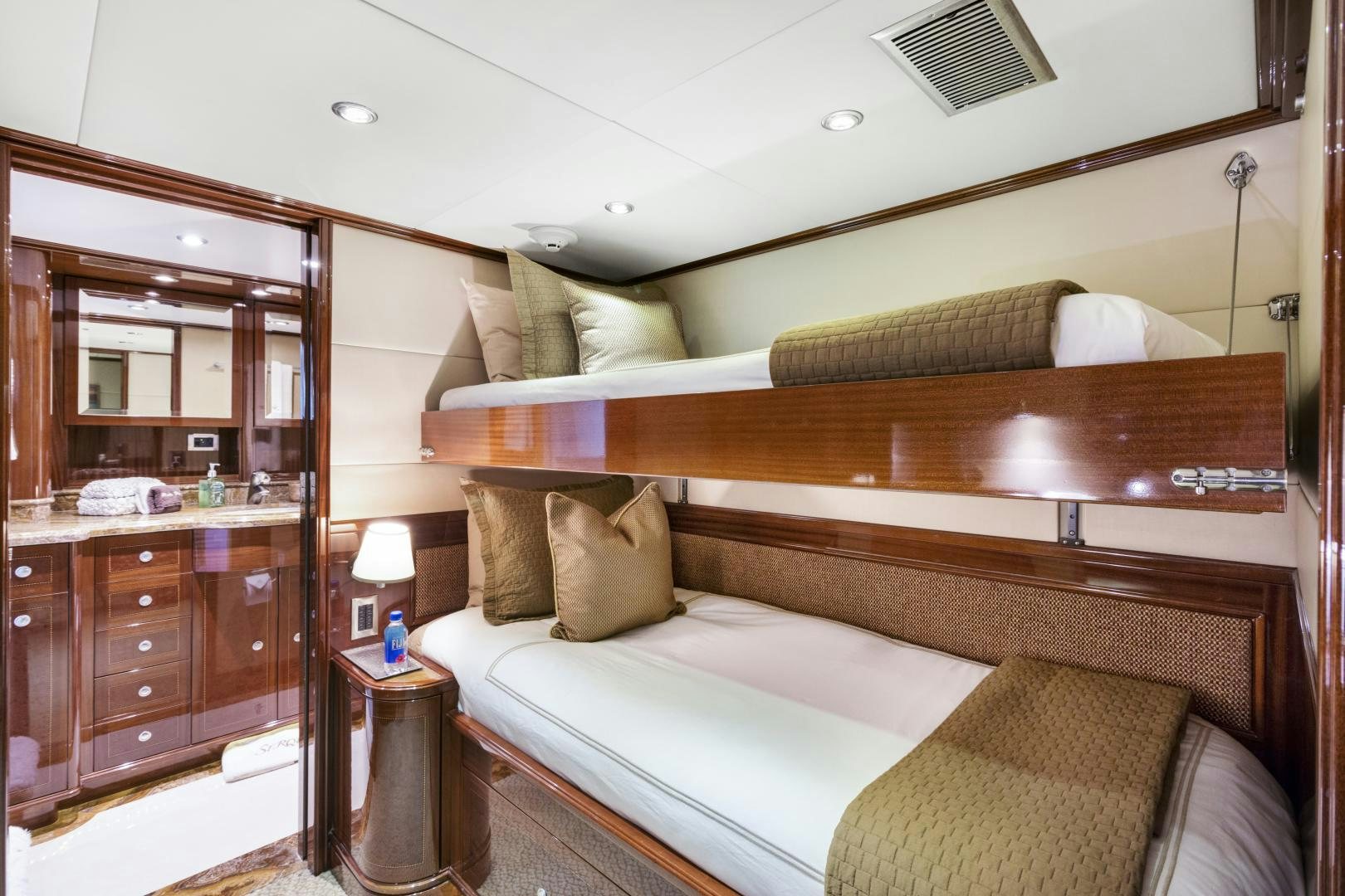 a bed in a room aboard SERQUE Yacht for Sale
