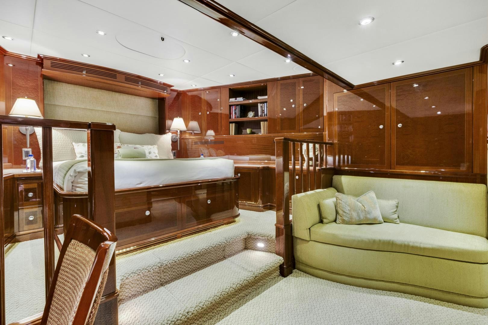 a bed and a couch in a room aboard SERQUE Yacht for Sale