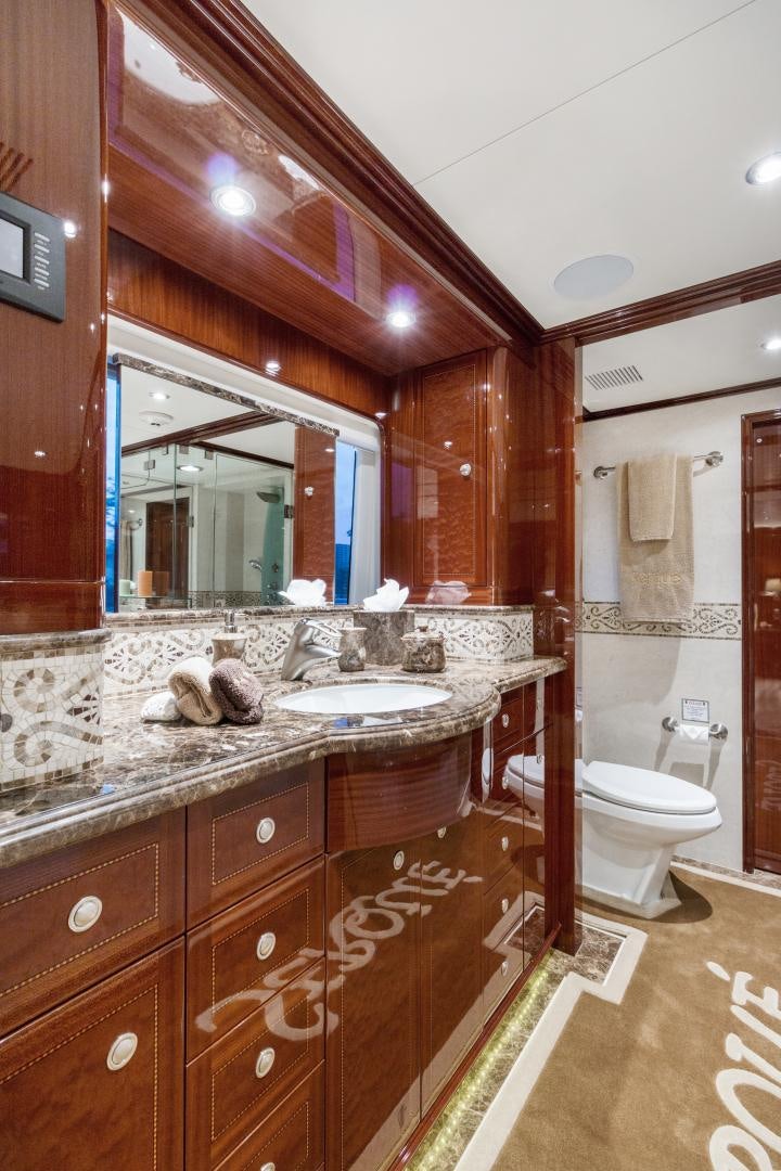 a bathroom with a large mirror aboard SERQUE Yacht for Sale