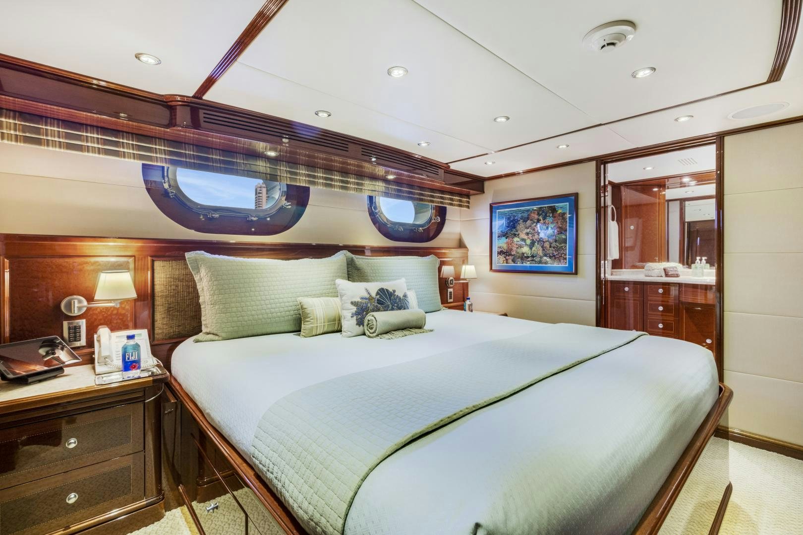 a bedroom with a large bed aboard SERQUE Yacht for Sale