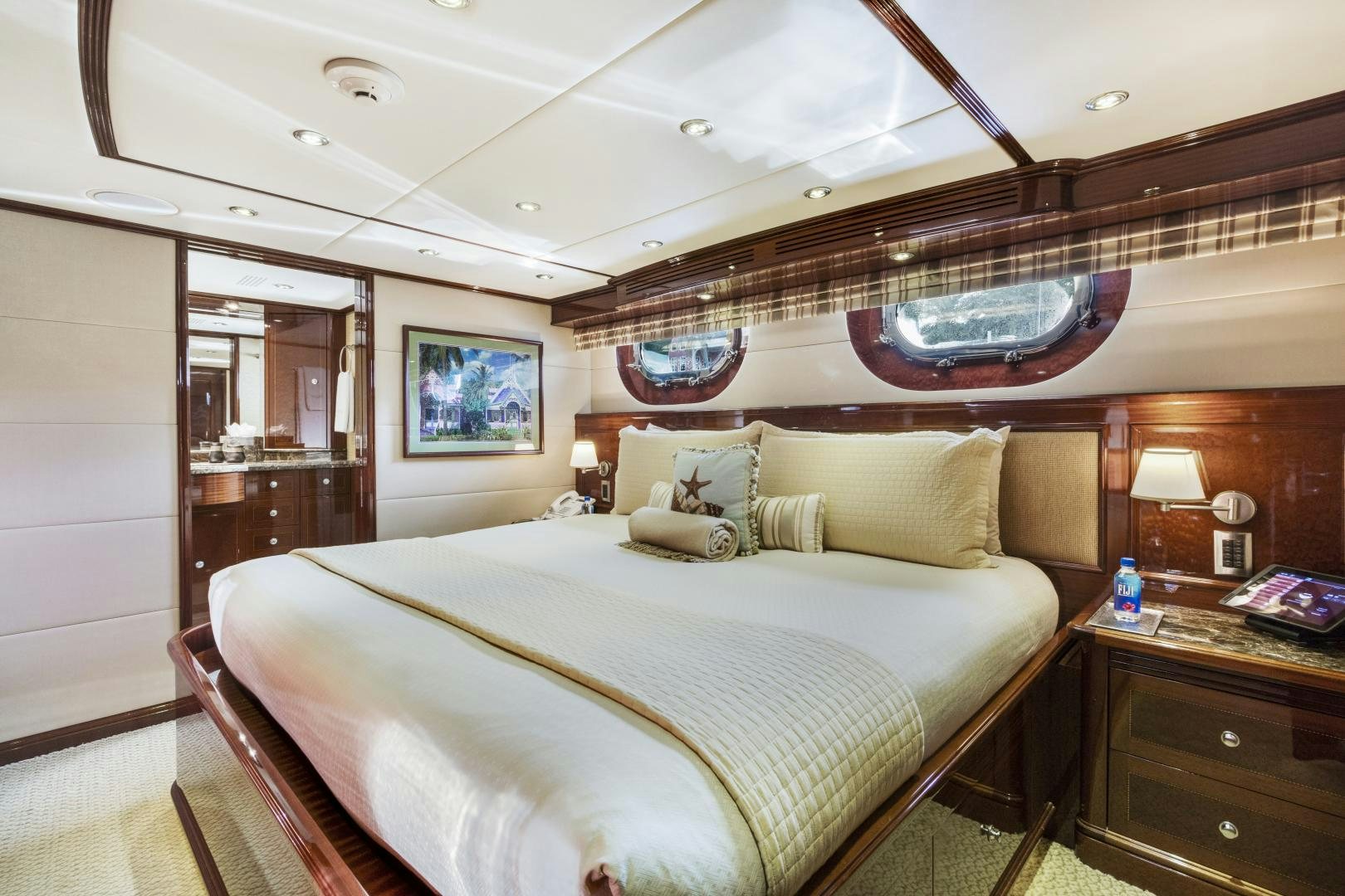 a bedroom with a large bed aboard SERQUE Yacht for Sale