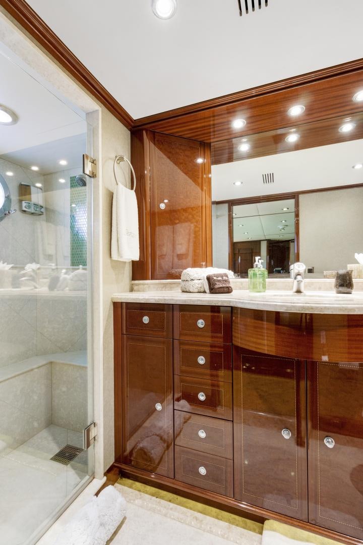 a bathroom with a large mirror aboard SERQUE Yacht for Sale