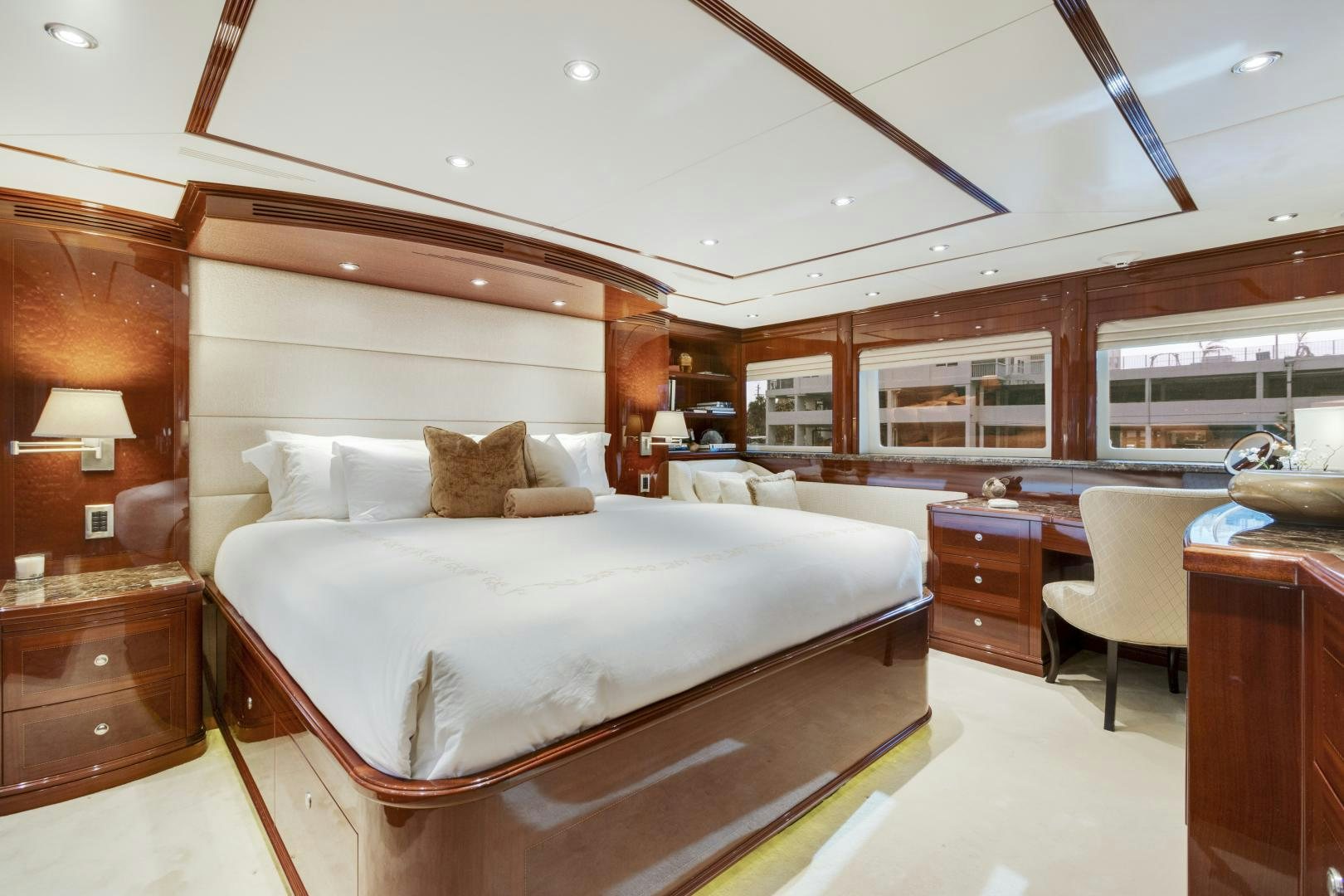 a large bedroom with a large bed aboard SERQUE Yacht for Sale
