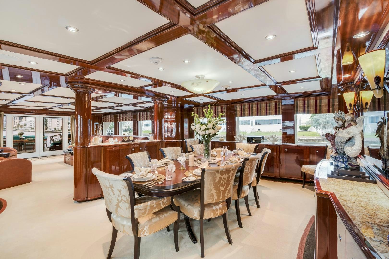 a large dining room with a table aboard SERQUE Yacht for Sale