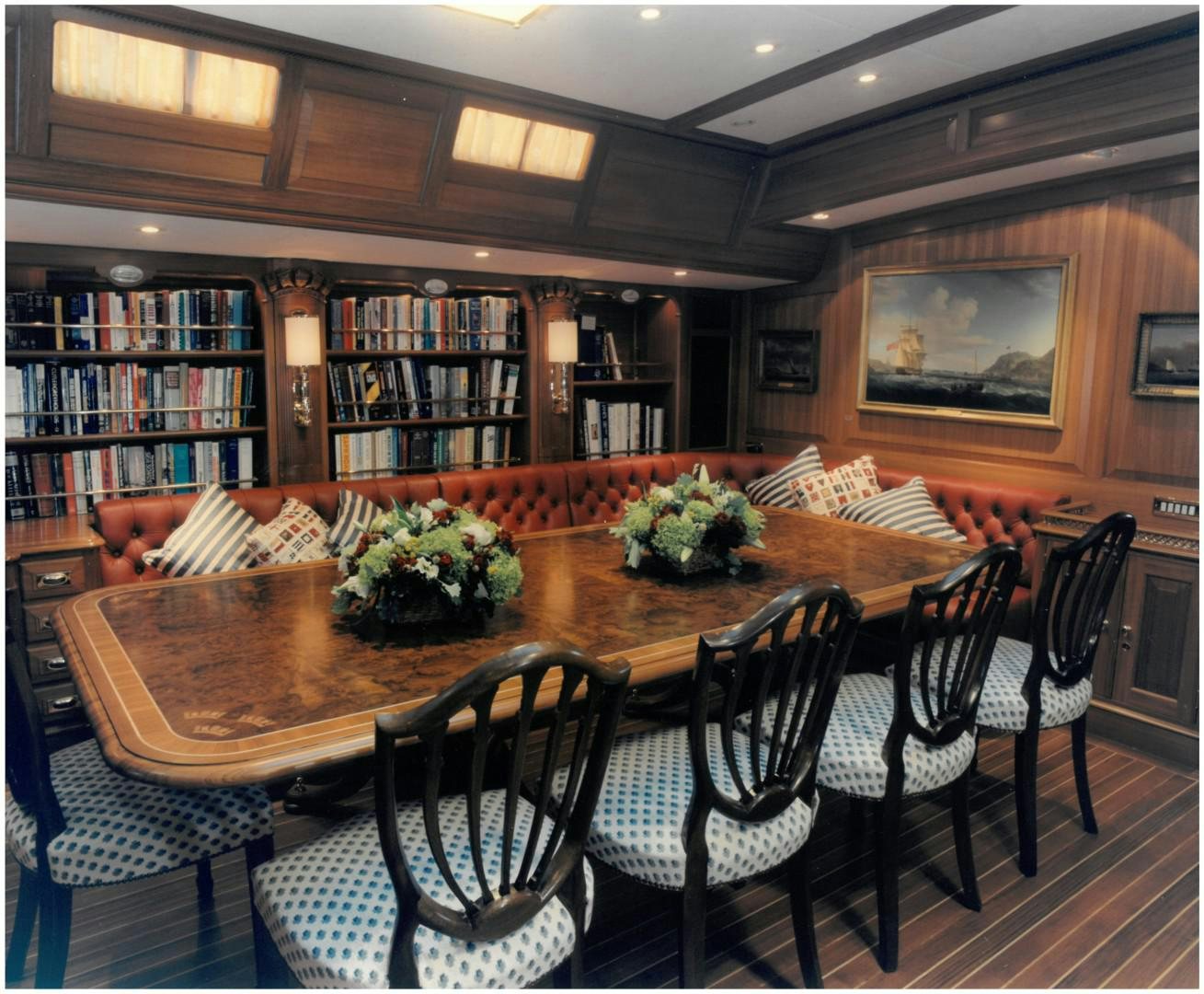 a dining table in a room aboard ANAKENA Yacht for Sale