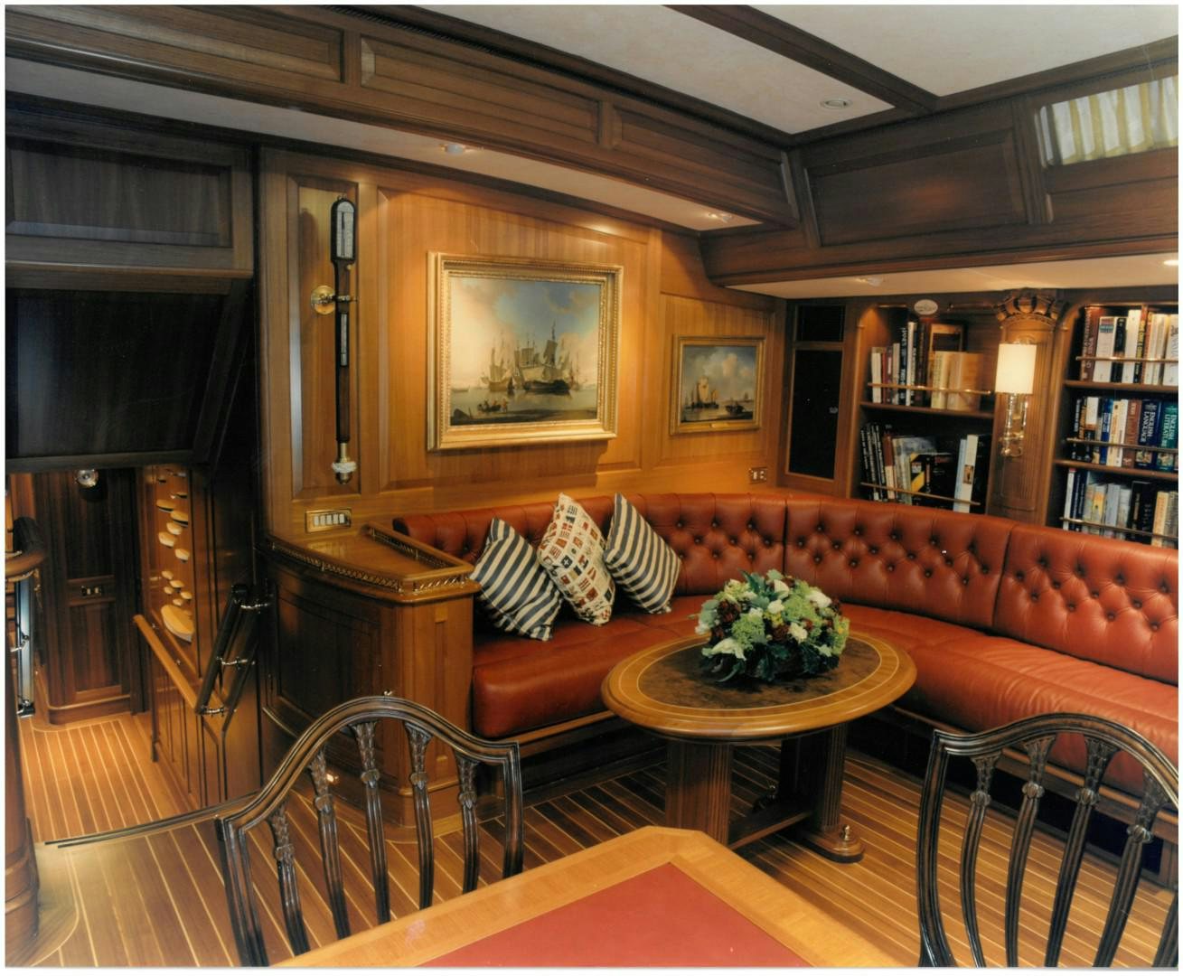 a living room with a couch and a coffee table aboard ANAKENA Yacht for Sale