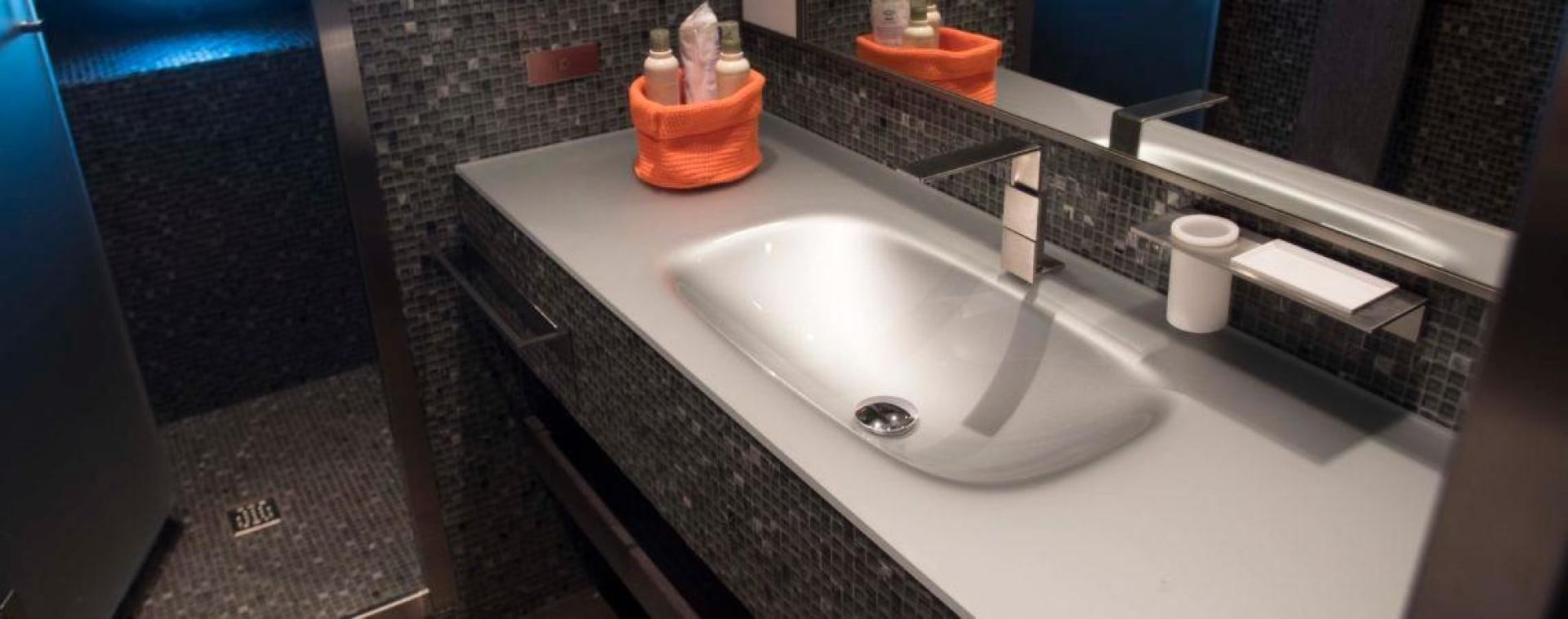 a sink with a mirror above it aboard NO NAME Yacht for Sale