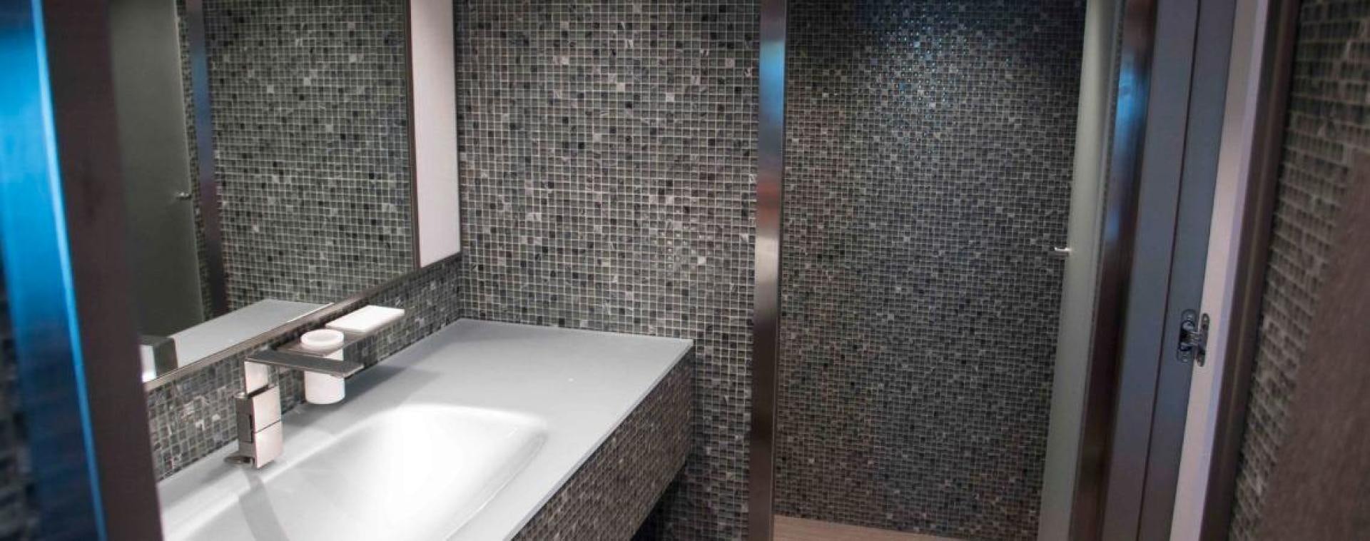 a bathroom with a sink and a mirror aboard NO NAME Yacht for Sale