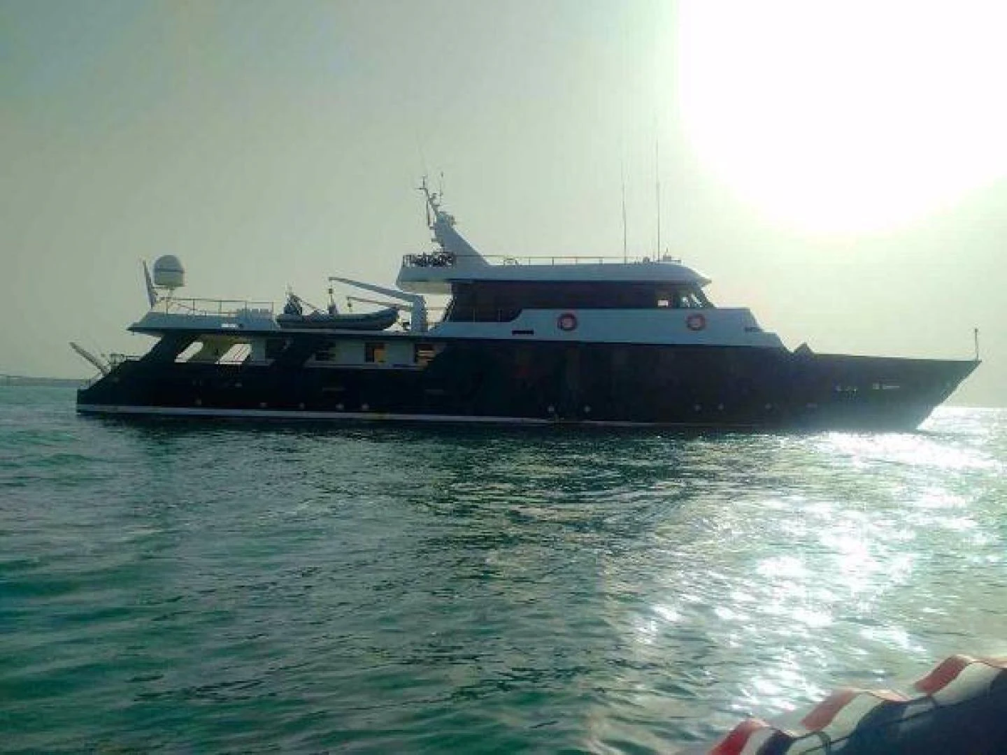 a boat on the water aboard STAR ALLIANCE Yacht for Sale