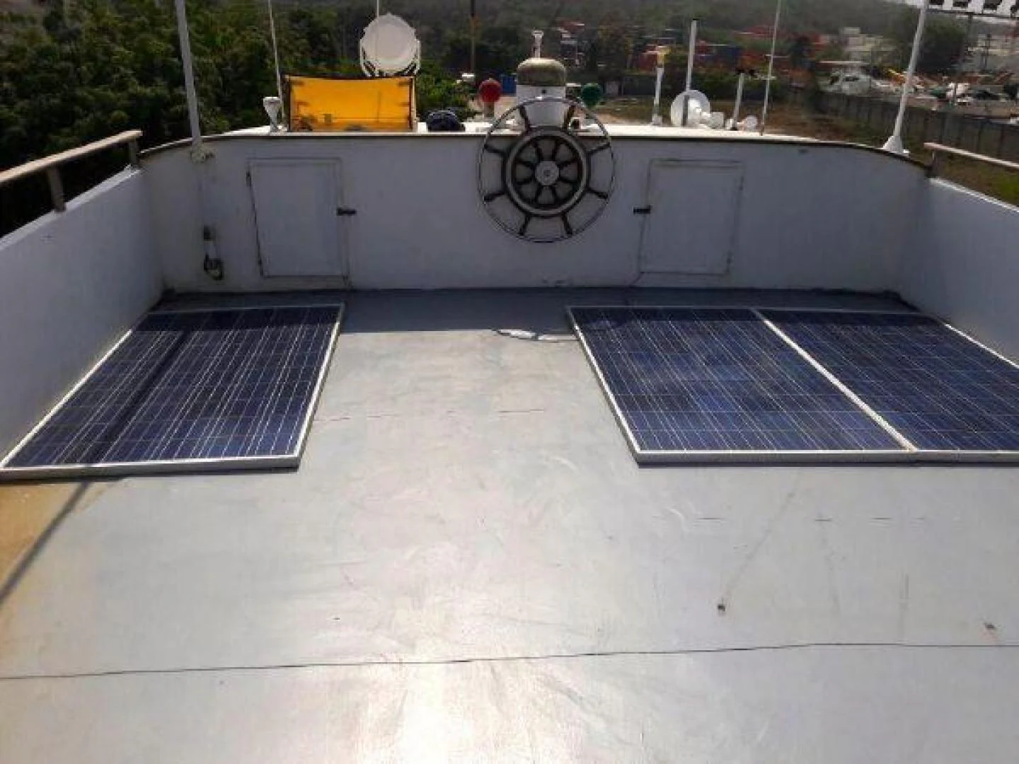 a person standing on a roof aboard STAR ALLIANCE Yacht for Sale