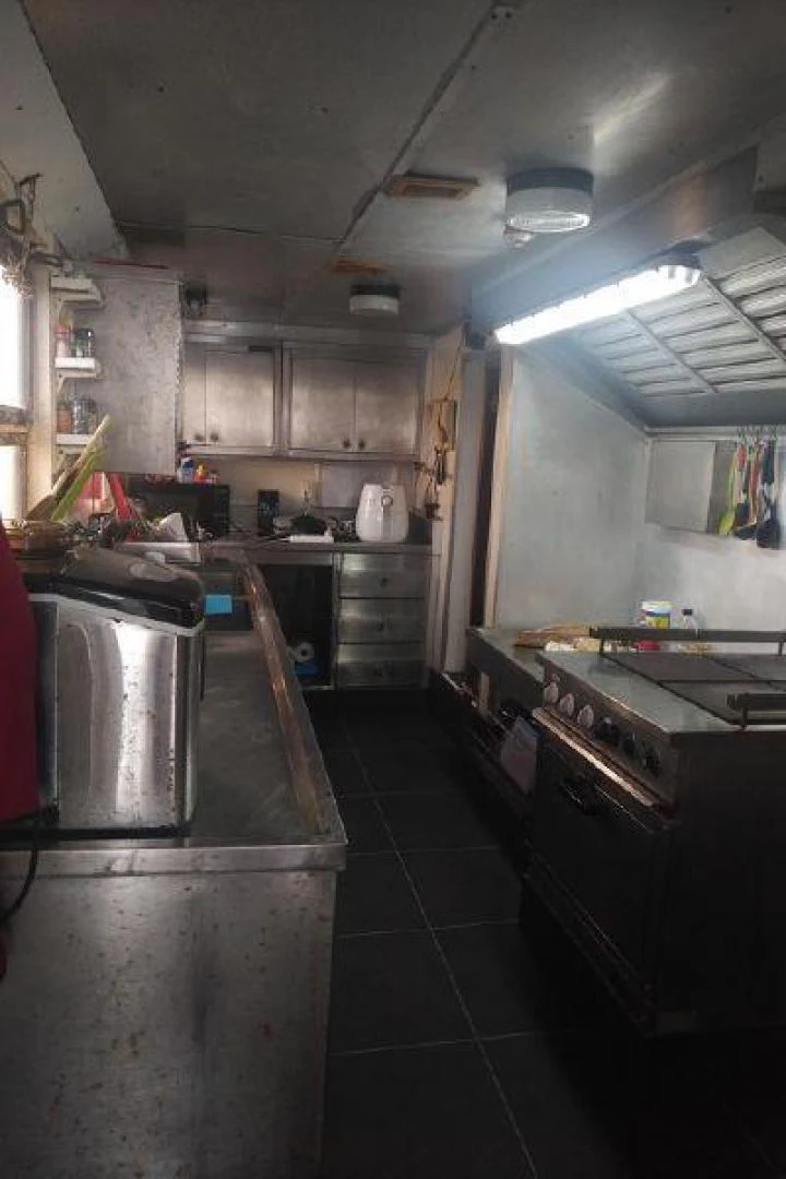 a kitchen with a stainless steel oven aboard STAR ALLIANCE Yacht for Sale