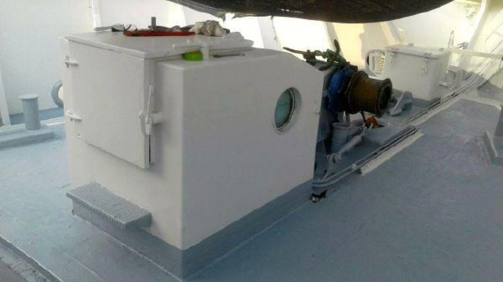 a white machine with a person standing next to it aboard STAR ALLIANCE Yacht for Sale