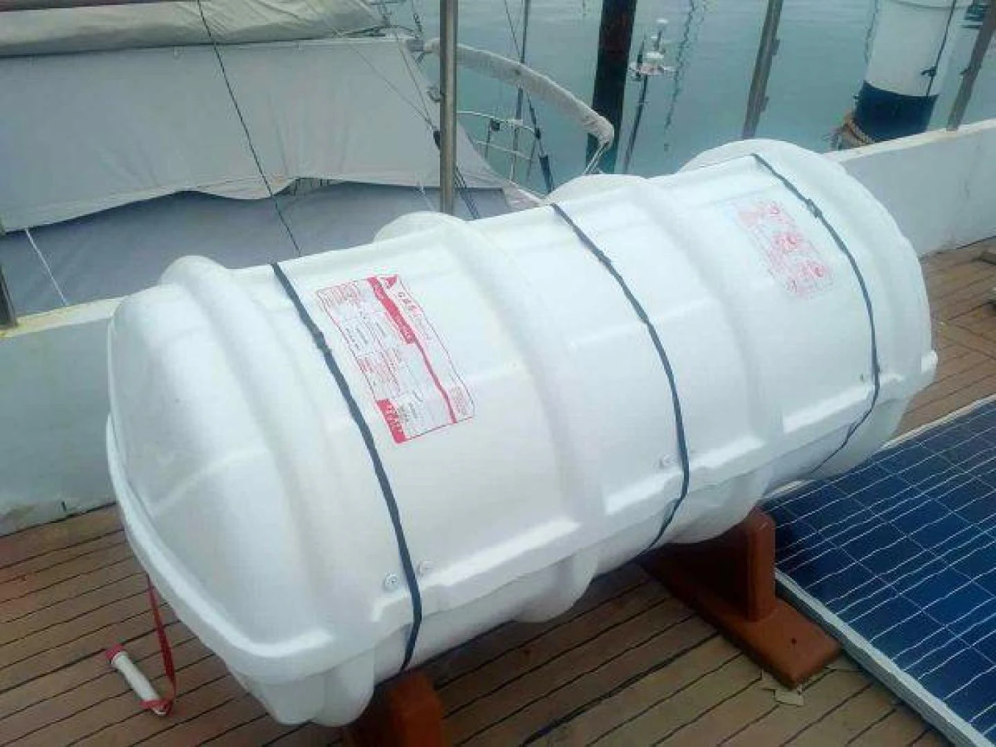 a white chair on a wooden stand aboard STAR ALLIANCE Yacht for Sale