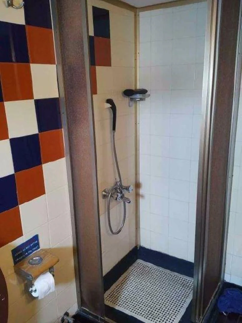 a shower with a shower curtain aboard STAR ALLIANCE Yacht for Sale