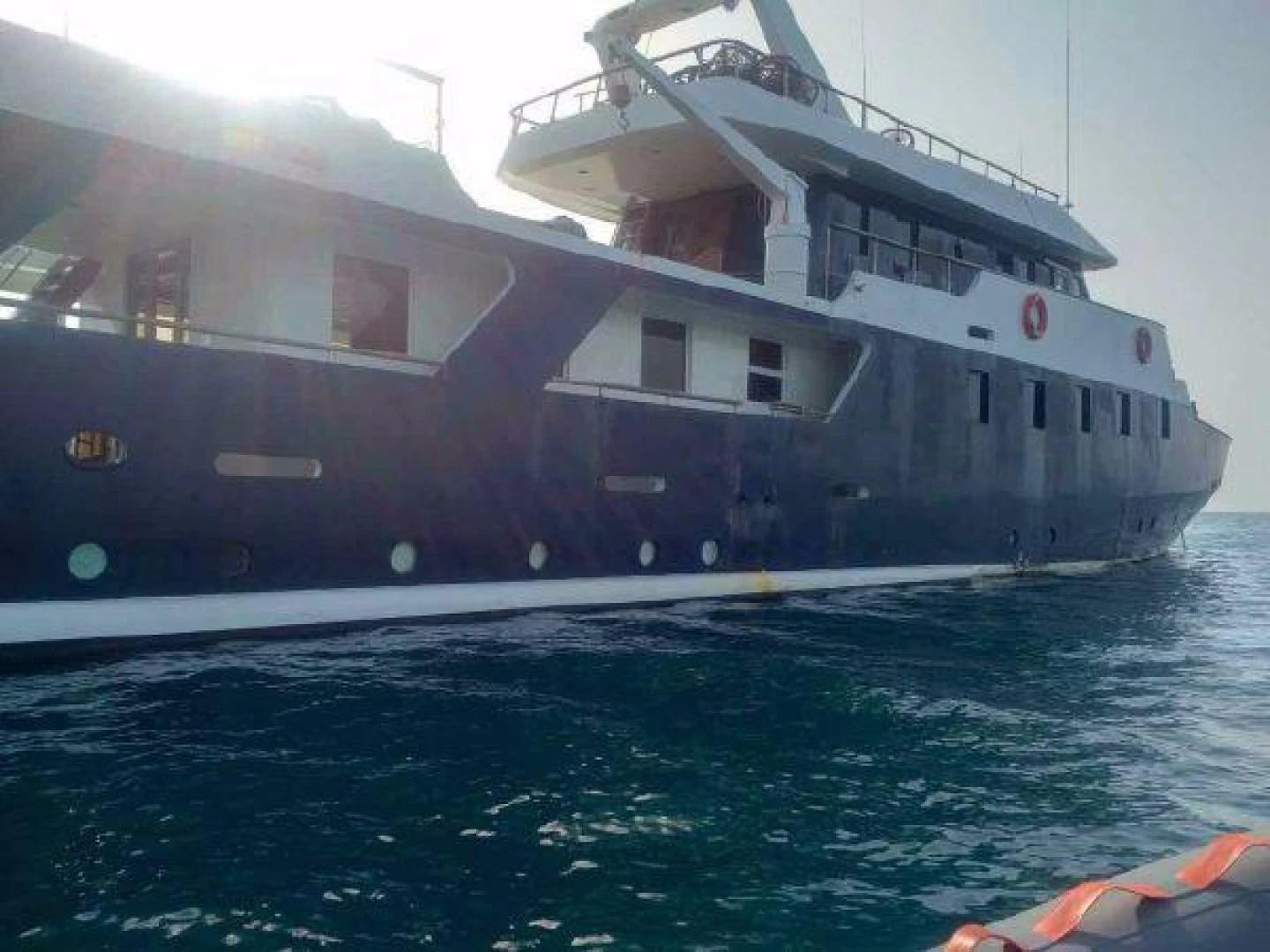 a large ship in the water aboard STAR ALLIANCE Yacht for Sale