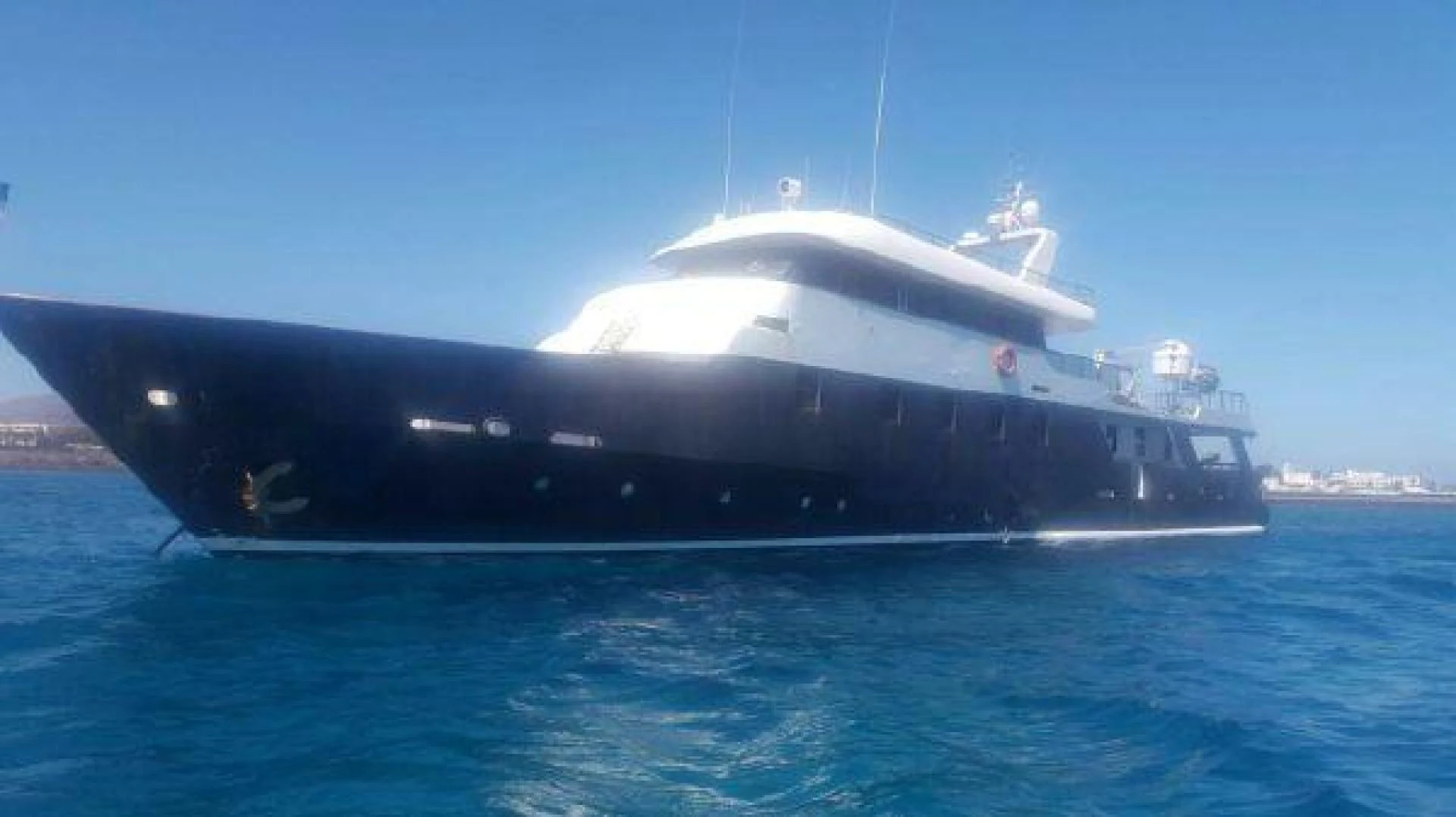 a large ship in the water aboard STAR ALLIANCE Yacht for Sale