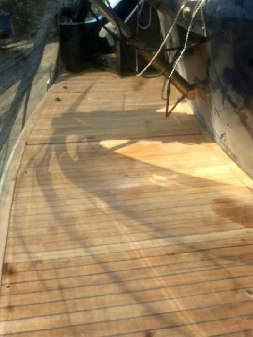 a wooden deck with a wood floor aboard STAR ALLIANCE Yacht for Sale