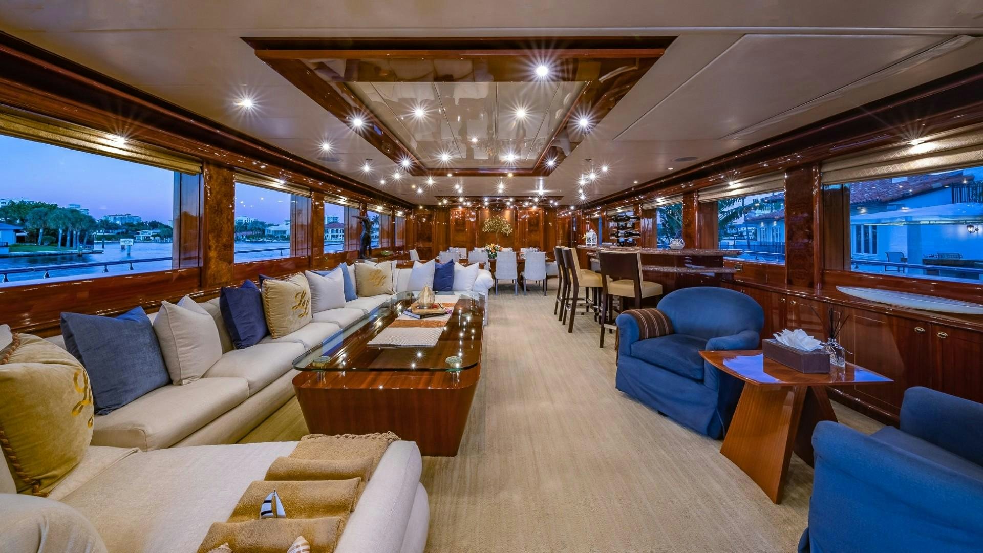 a living room with a large window aboard LADY LEILA Yacht for Sale