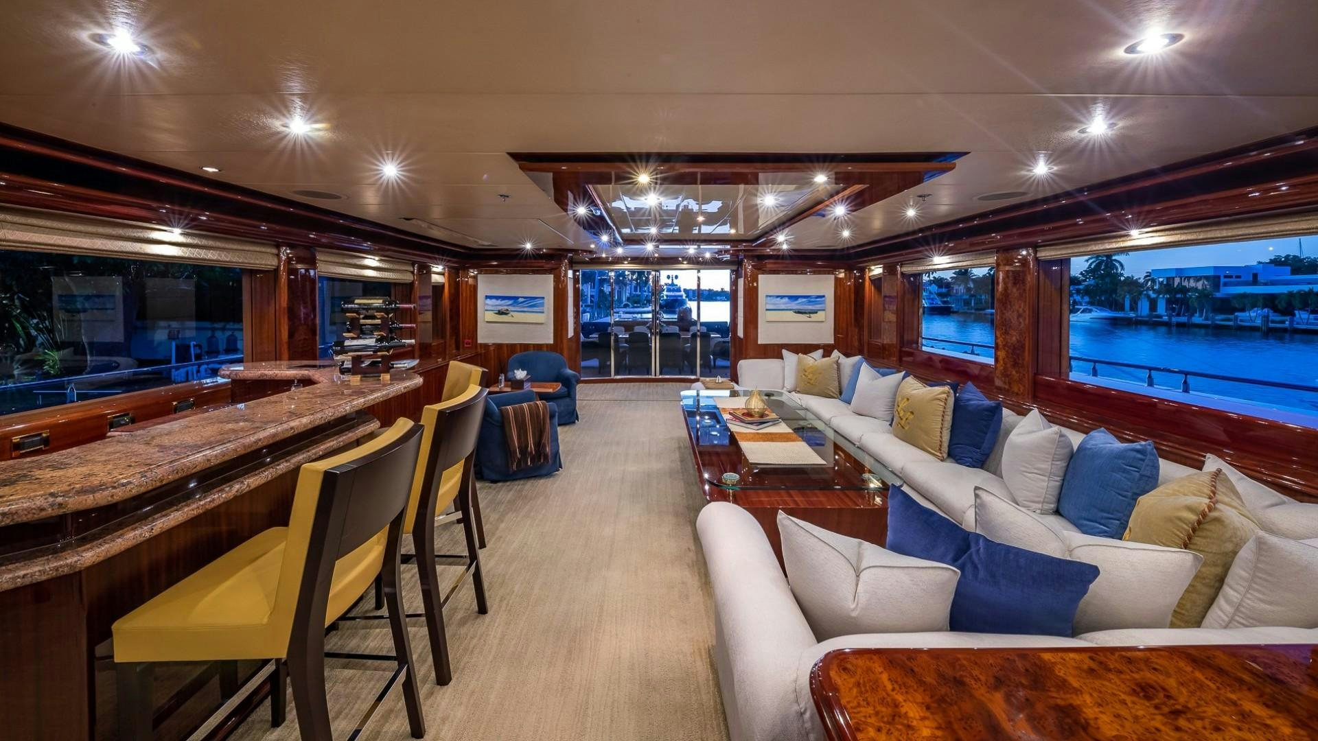 a living room with a large window aboard LADY LEILA Yacht for Sale