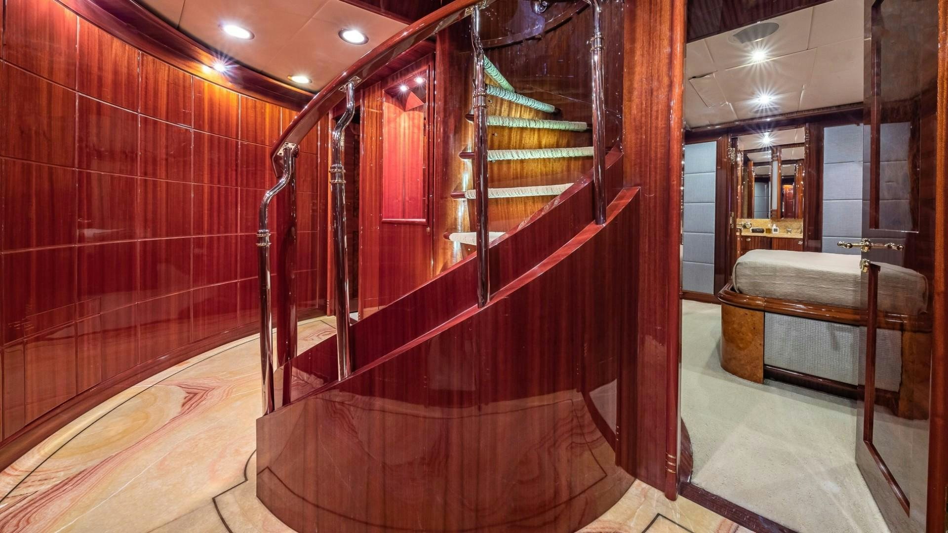 a room with a bench and a table aboard LADY LEILA Yacht for Sale