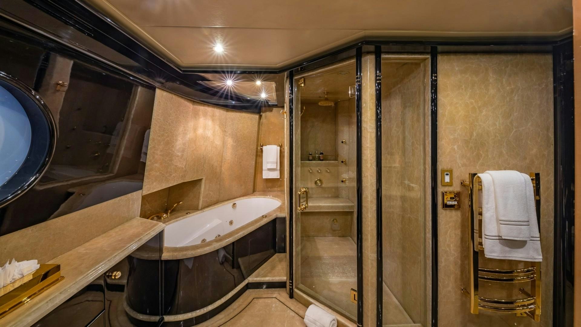 a bathroom with a sink and a mirror aboard LADY LEILA Yacht for Sale