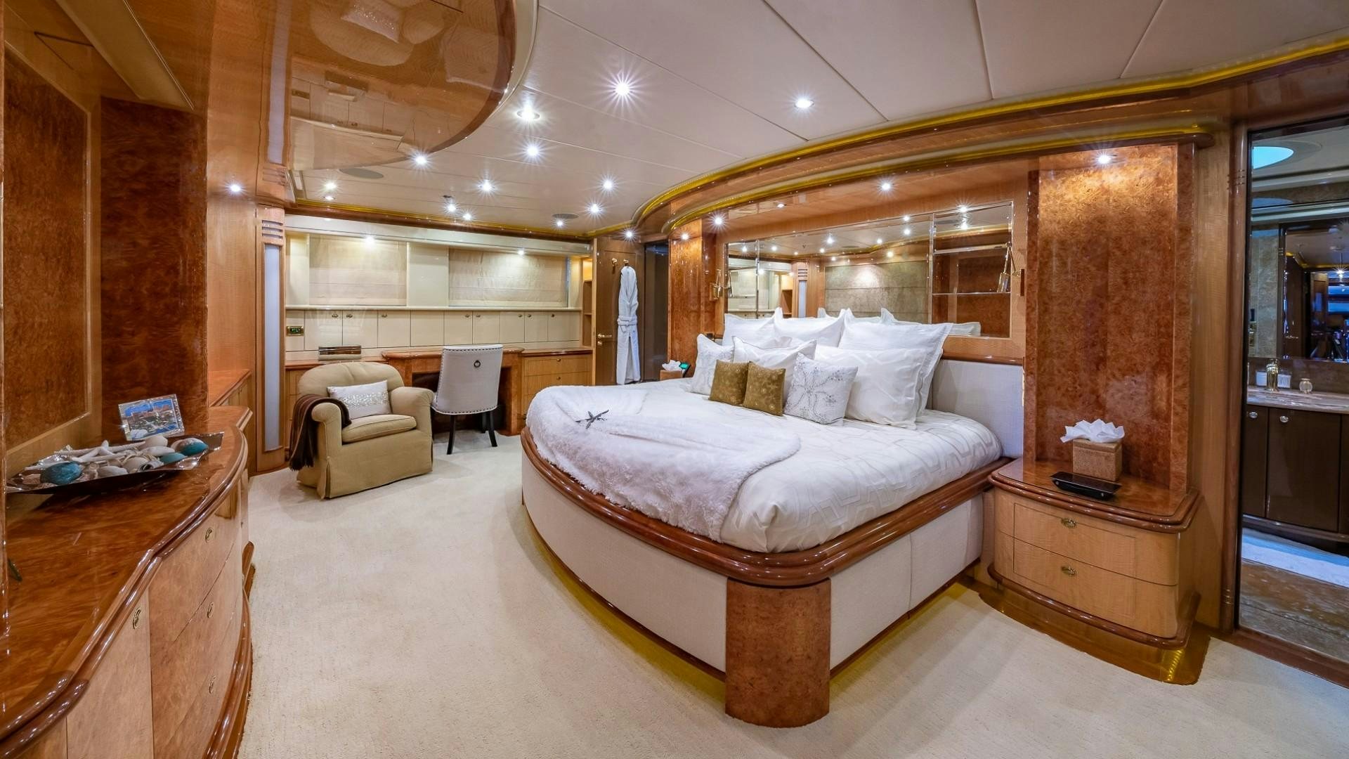 a large bed in a room aboard LADY LEILA Yacht for Sale