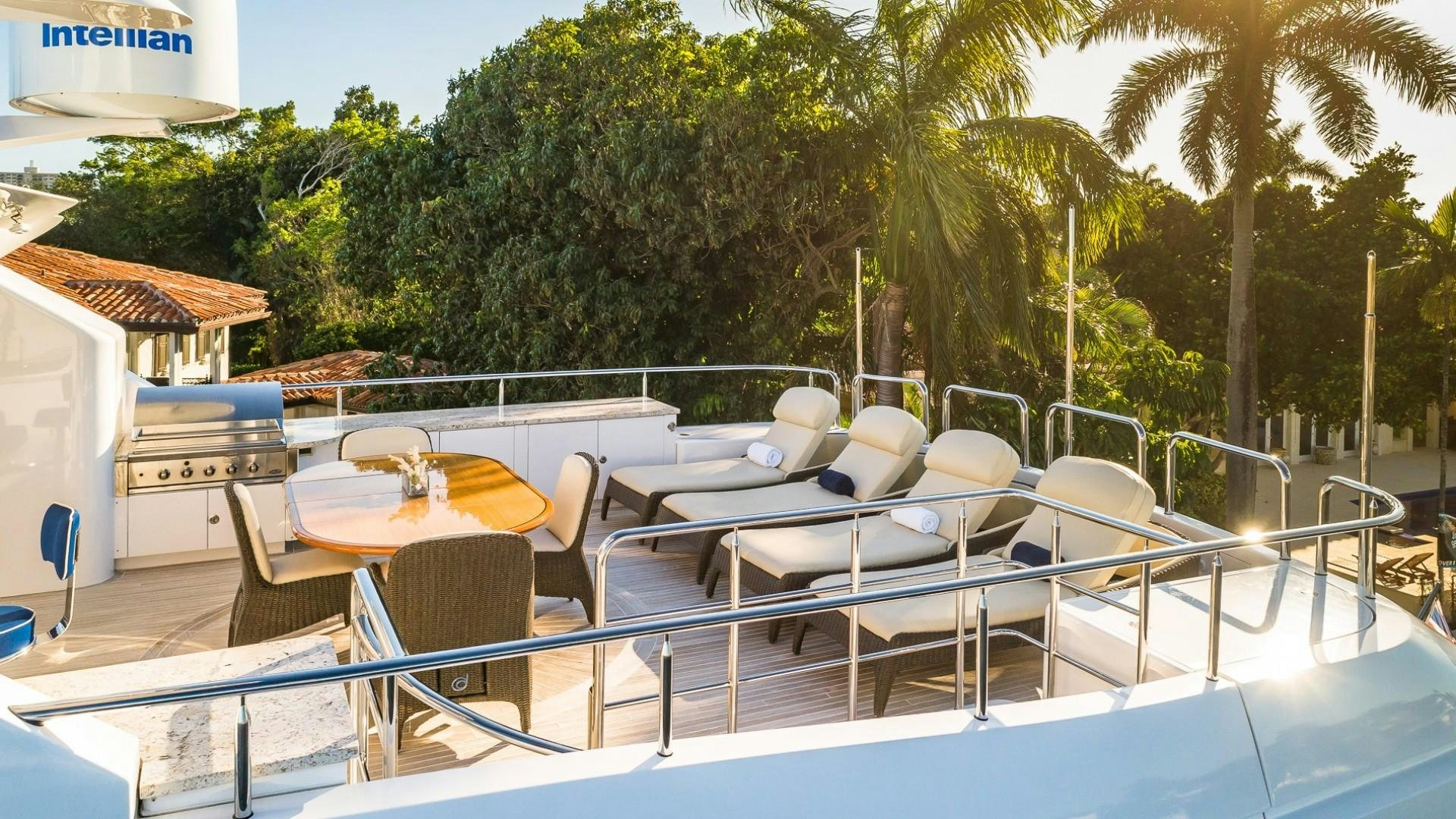 a pool with tables and chairs aboard LADY LEILA Yacht for Sale