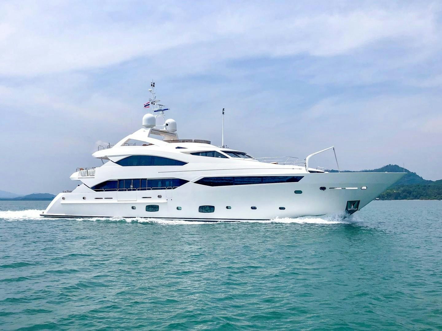 a white yacht in the water aboard ABOUT TIME Yacht for Sale