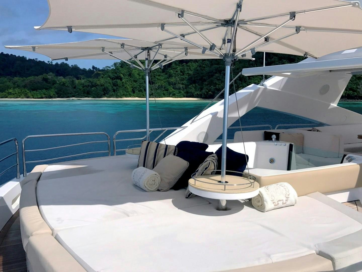 a lounge chair on a boat aboard ABOUT TIME Yacht for Sale