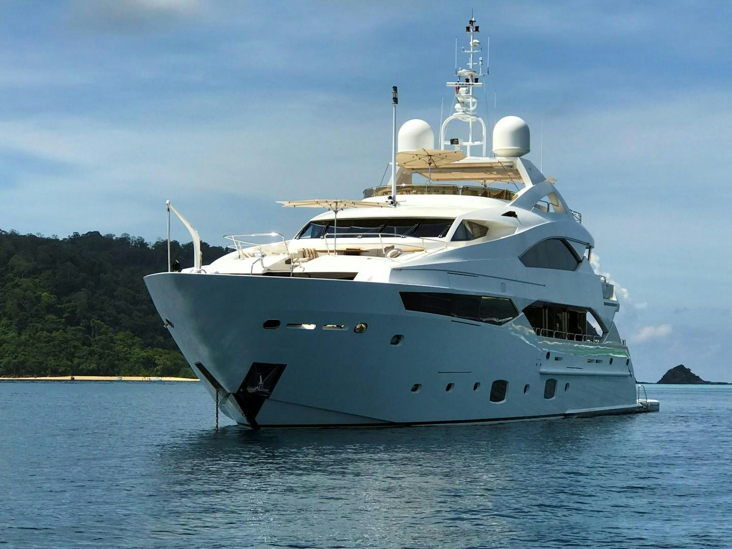 a white yacht in the water aboard ABOUT TIME Yacht for Sale