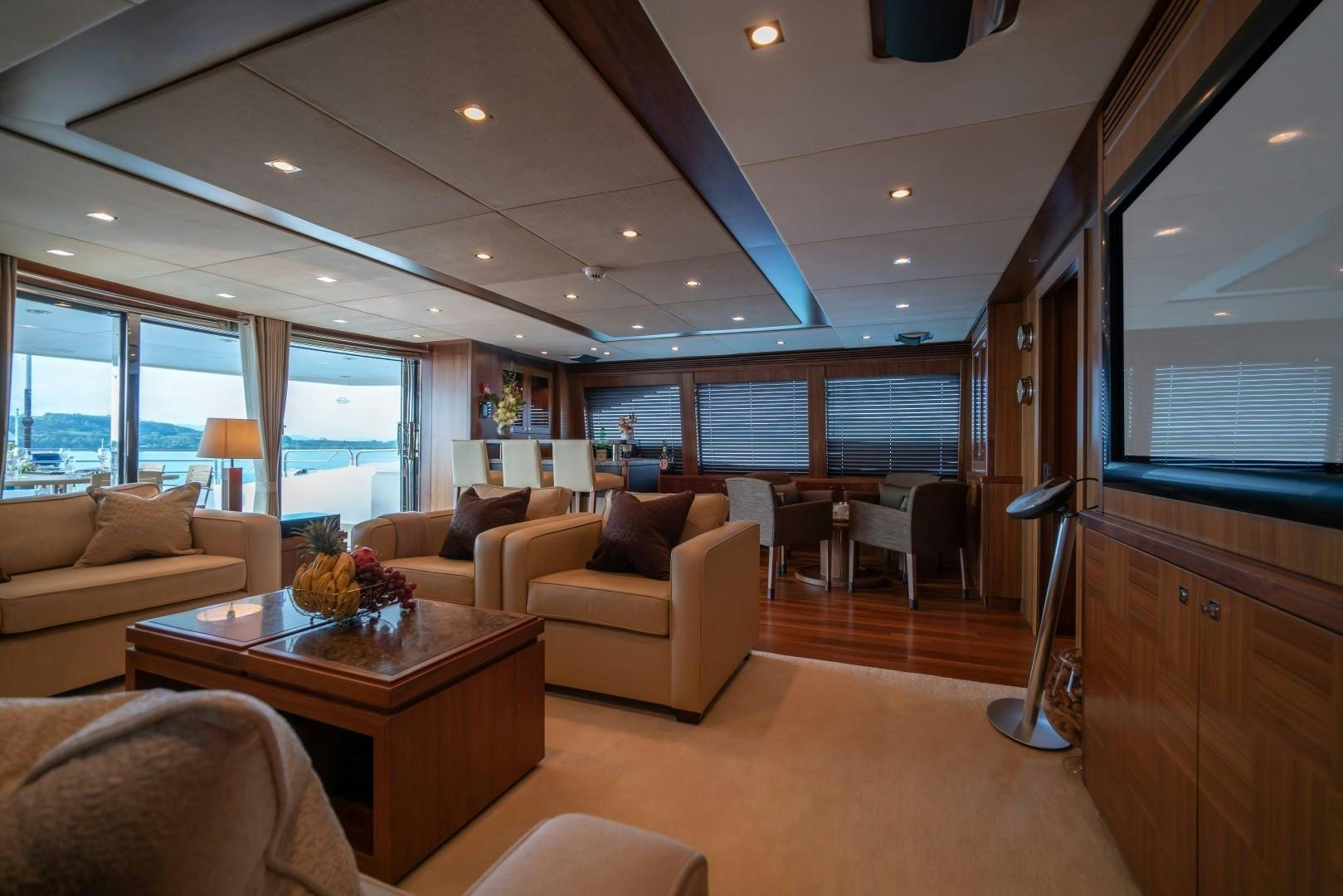 a living room with a large window aboard ABOUT TIME Yacht for Sale