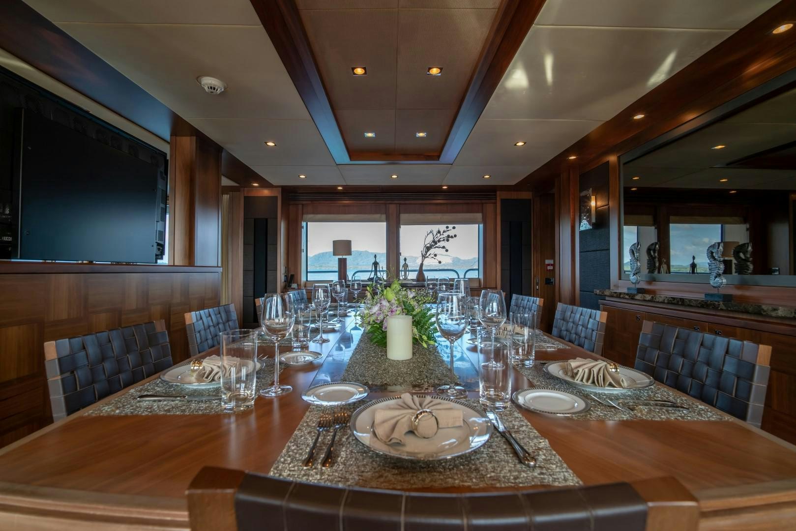 a large dining room table aboard ABOUT TIME Yacht for Sale