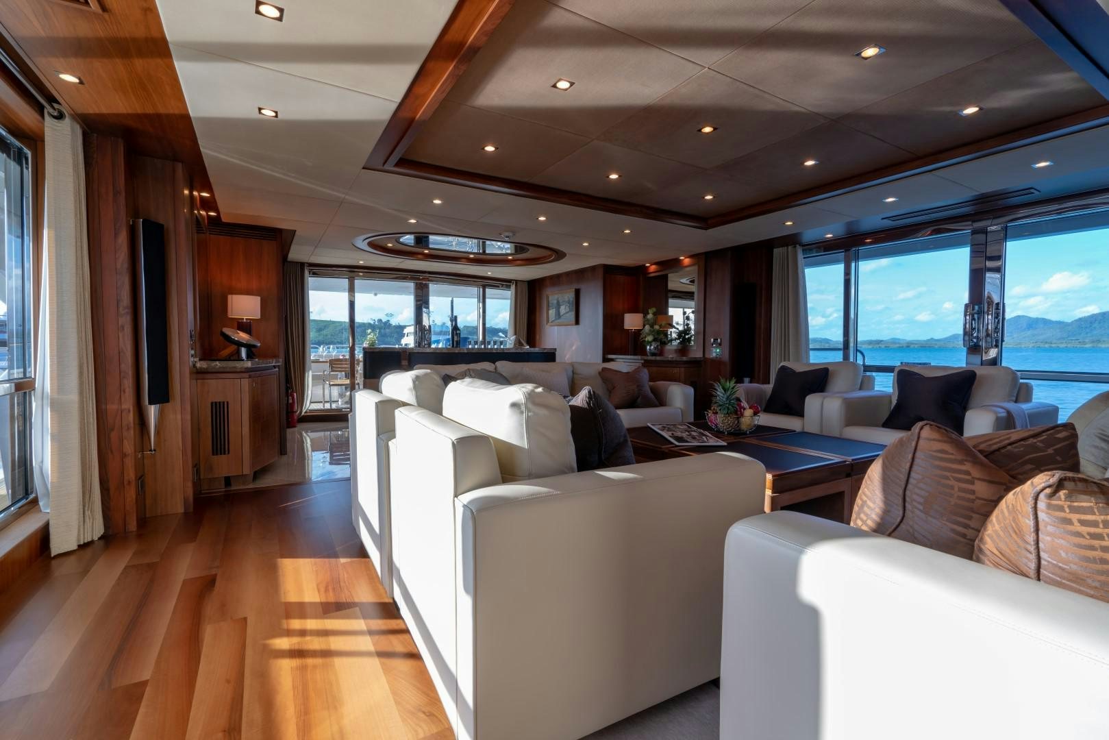 a living room with a large window aboard ABOUT TIME Yacht for Sale