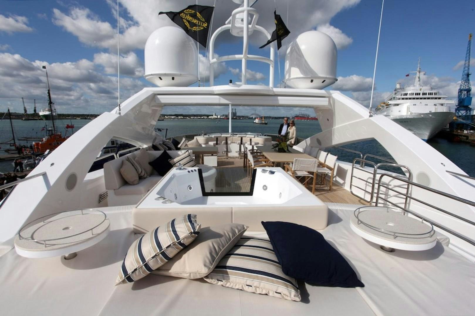 a boat with a white roof aboard ABOUT TIME Yacht for Sale