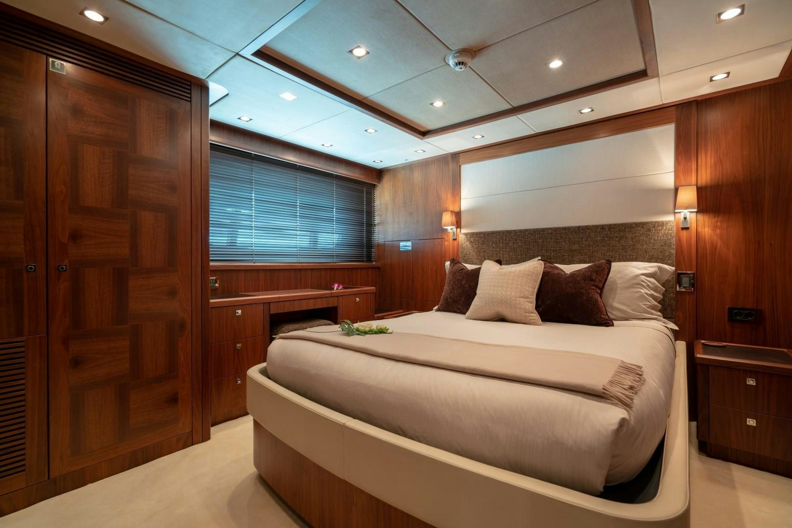 a bed in a room aboard ABOUT TIME Yacht for Sale