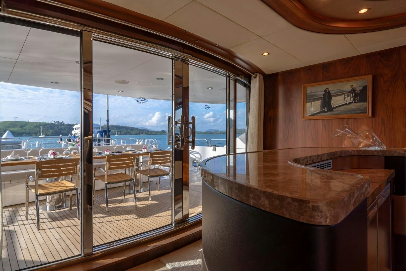 a room with a table and chairs aboard ABOUT TIME Yacht for Sale