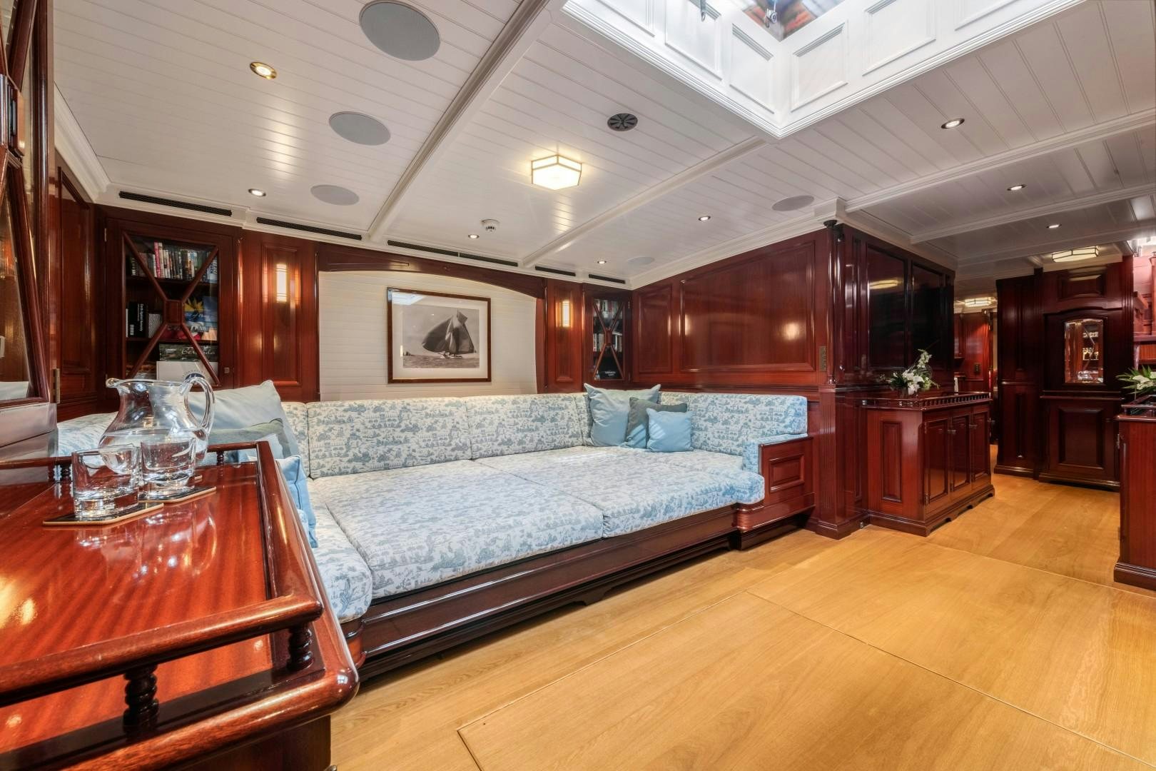 a large bedroom with a bed aboard RAINBOW Yacht for Sale