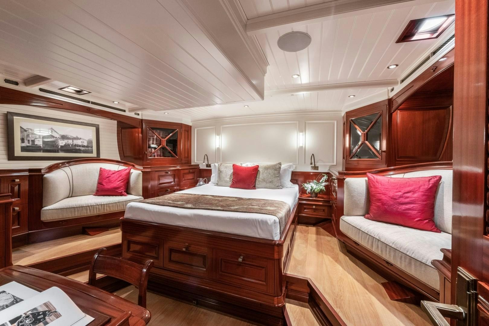 a room with two beds aboard RAINBOW Yacht for Sale
